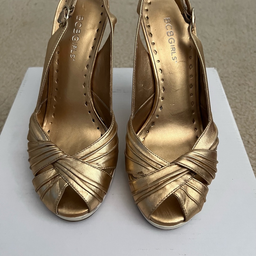 BCBGeneration Gold Heels with Twisted Knot Design